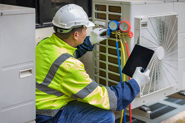 Professional Air Conditioning Repair technician working in Smithville, IN